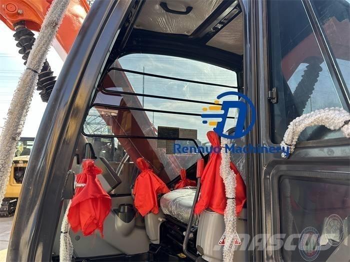 Hitachi ZX70 Гусеничні екскаватори