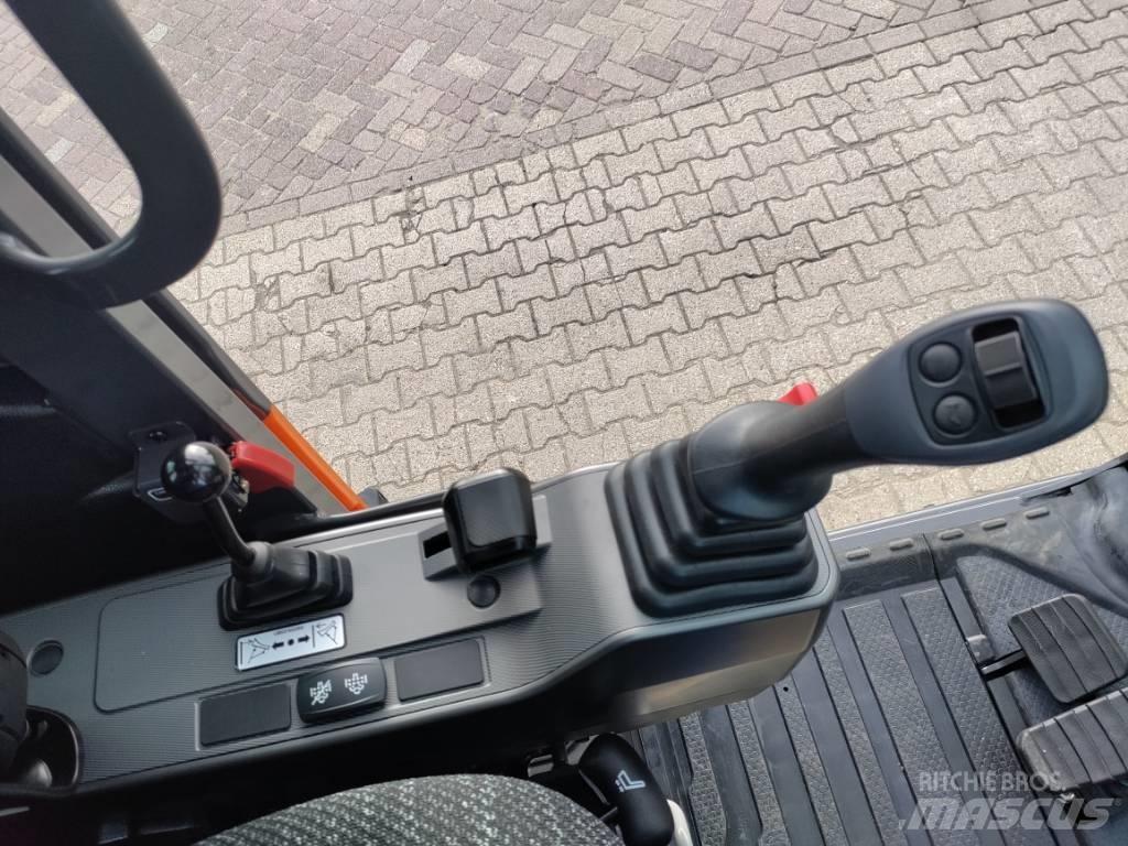 Develon DX100W-7 Колісні екскаватори