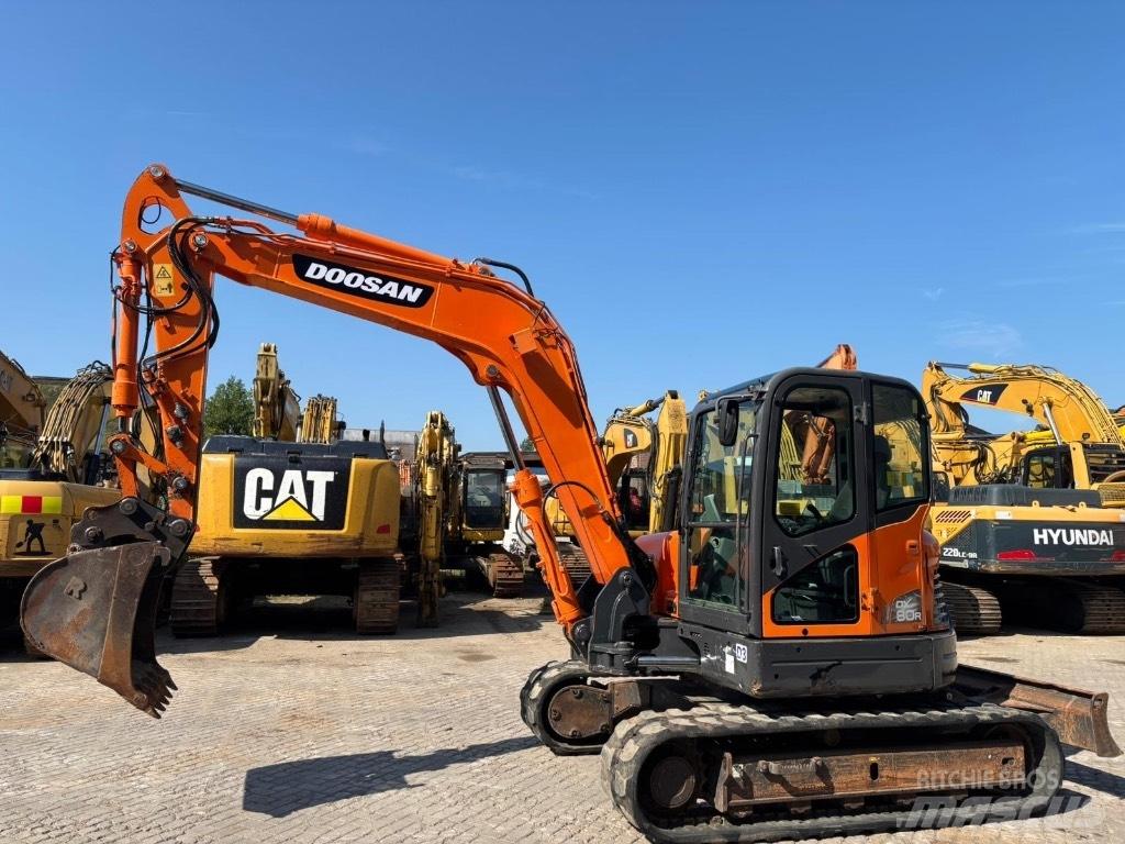 Doosan DX 80 R Середні екскаватори 7т. - 12т.