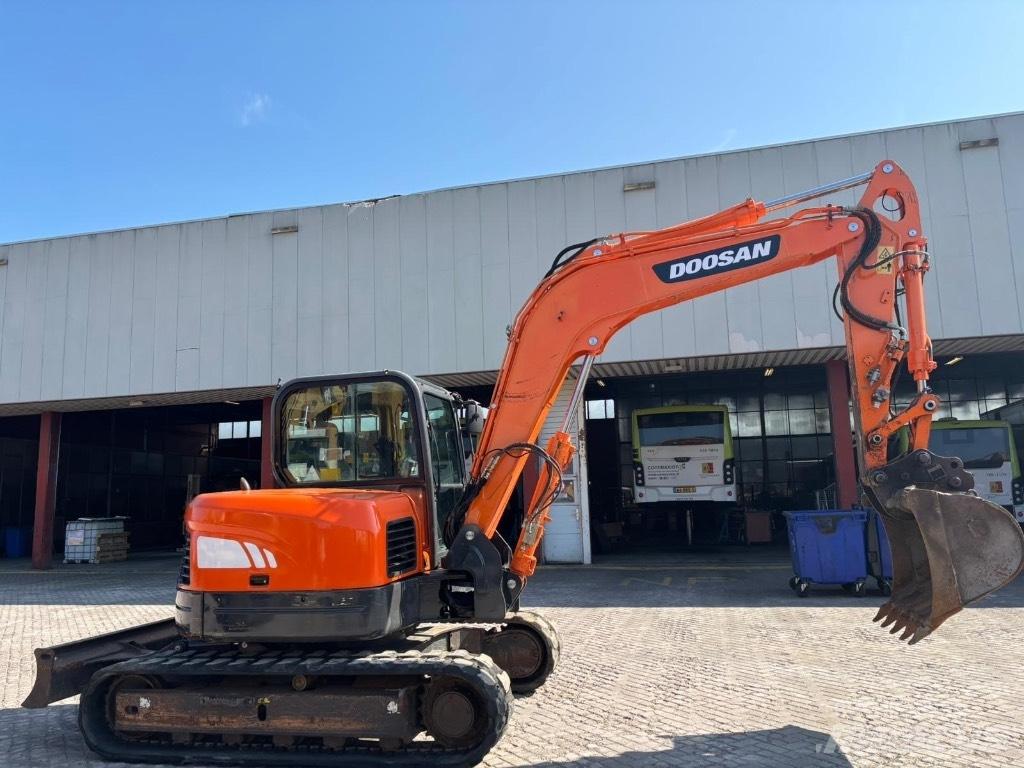 Doosan DX 80 R Середні екскаватори 7т. - 12т.