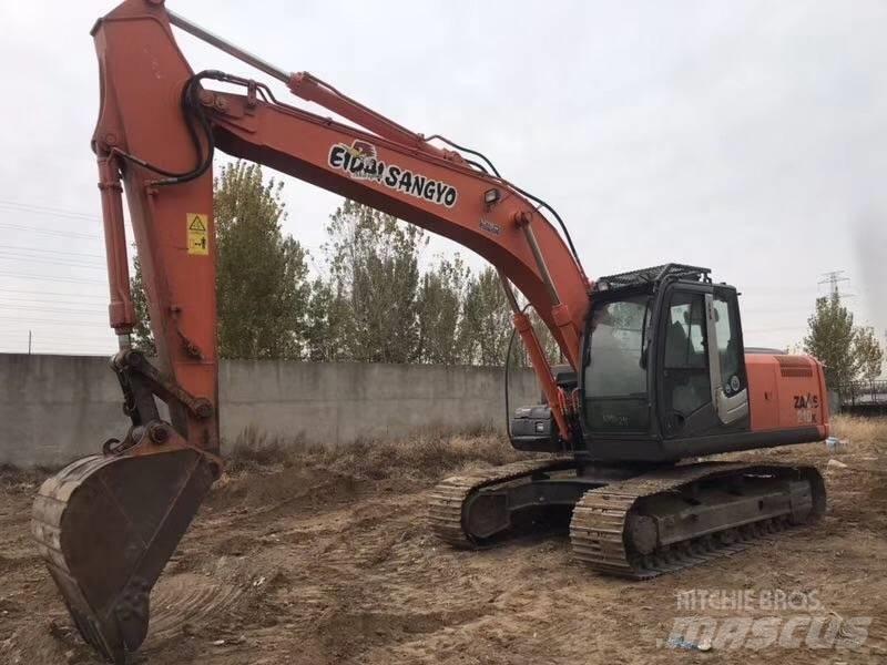 Hitachi zx210 Гусеничні екскаватори