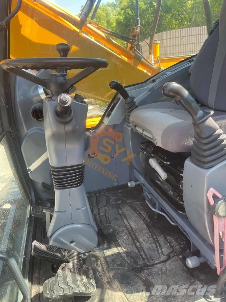 Hyundai 210W-9 Колісні екскаватори