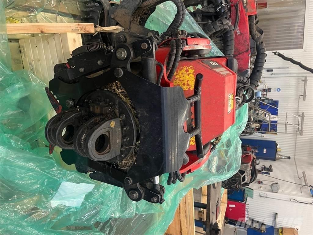 Komatsu C93 Валочні головки