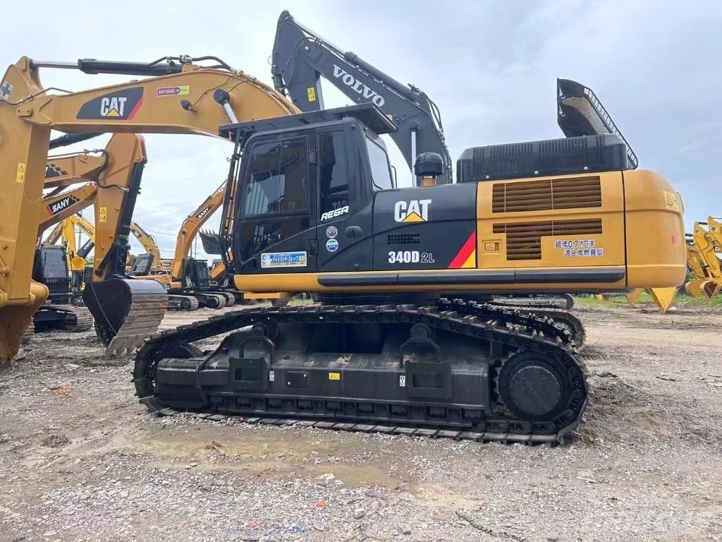CAT 340 Гусеничні екскаватори