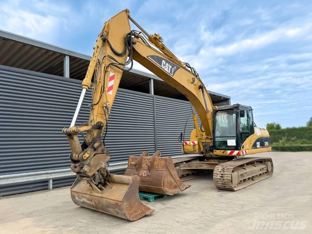CAT 320 DL Гусеничні екскаватори