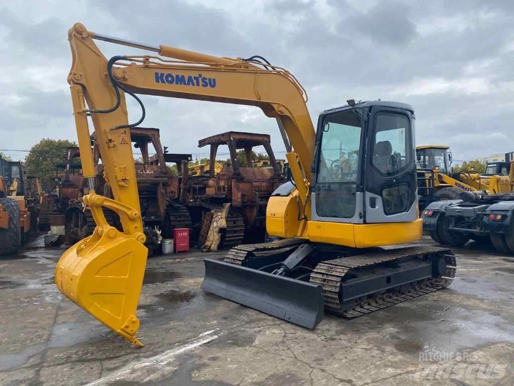 Komatsu pc78us Середні екскаватори 7т. - 12т.