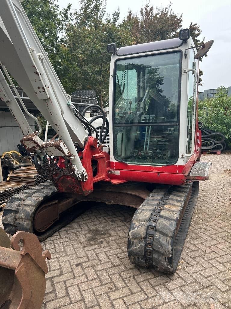 Takeuchi TB070 Міні-екскаватори < 7т