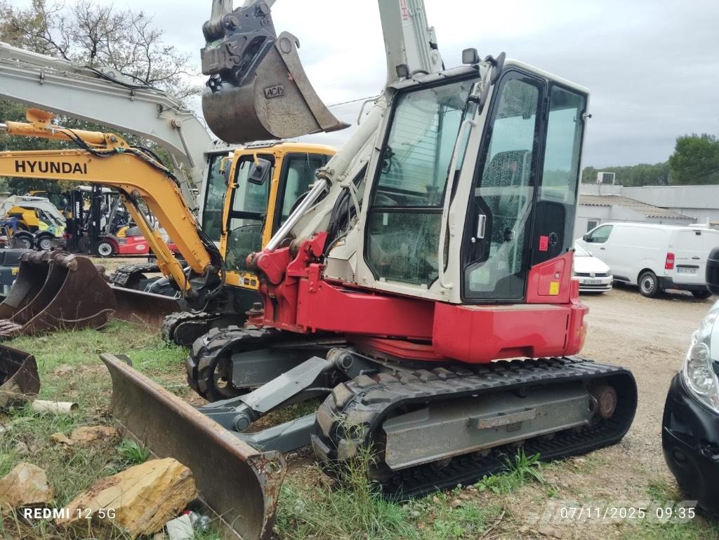 Takeuchi 280 FR Гусеничні екскаватори