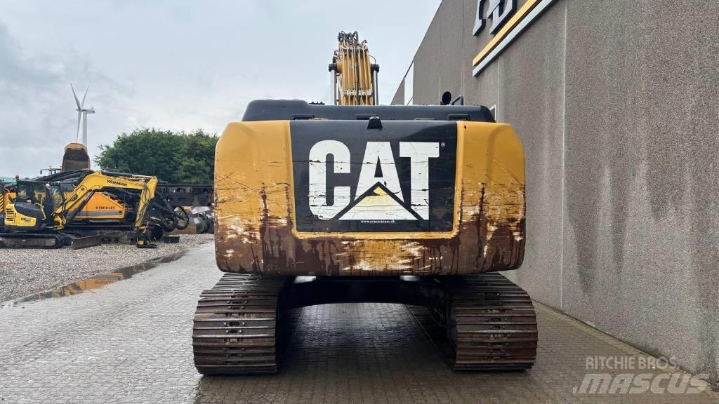 CAT 329E Гусеничні екскаватори