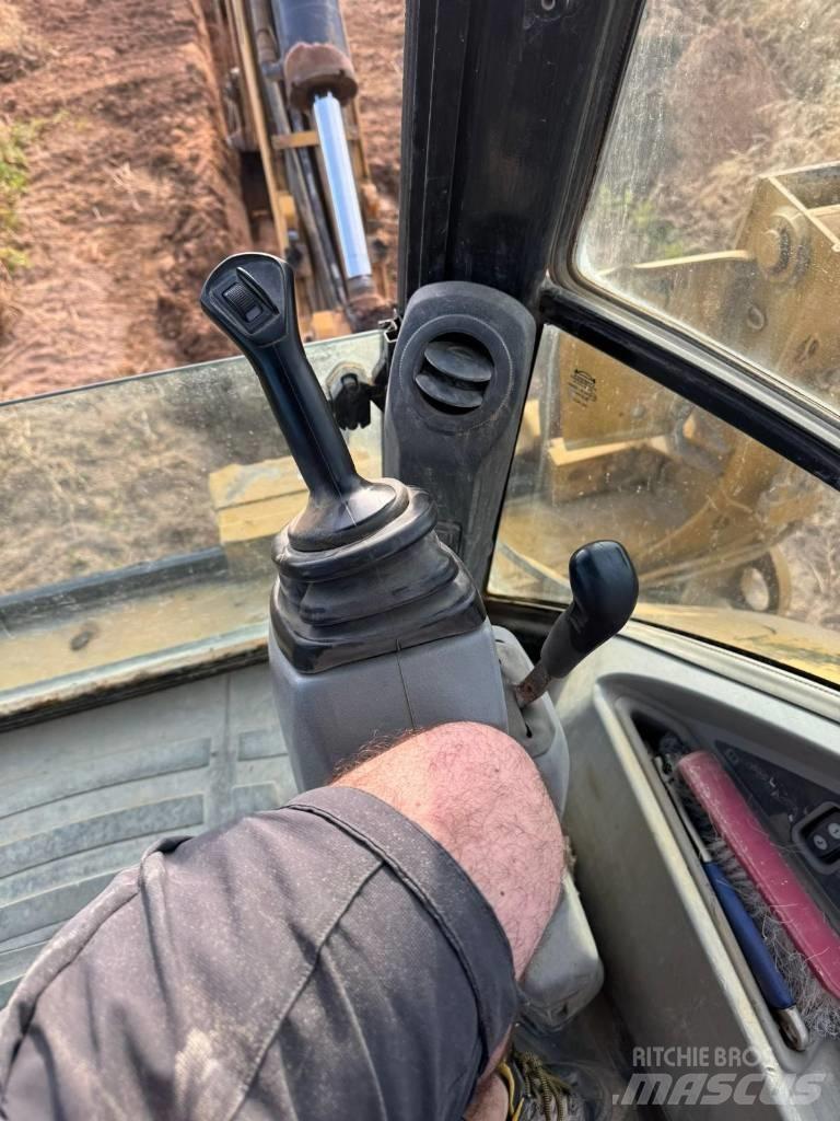 CAT 432 E Екскаватори-навантажувачі