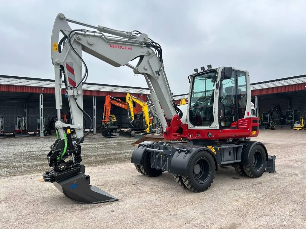 Takeuchi TB395W Колісні екскаватори