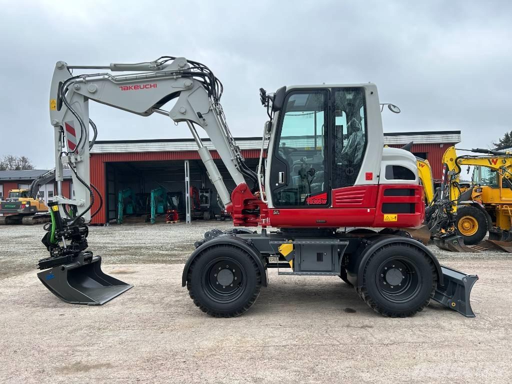 Takeuchi TB395W Колісні екскаватори