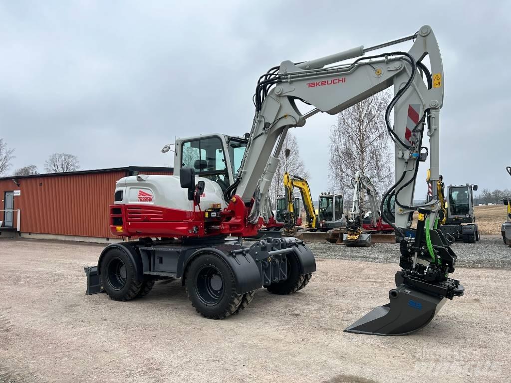 Takeuchi TB395W Колісні екскаватори