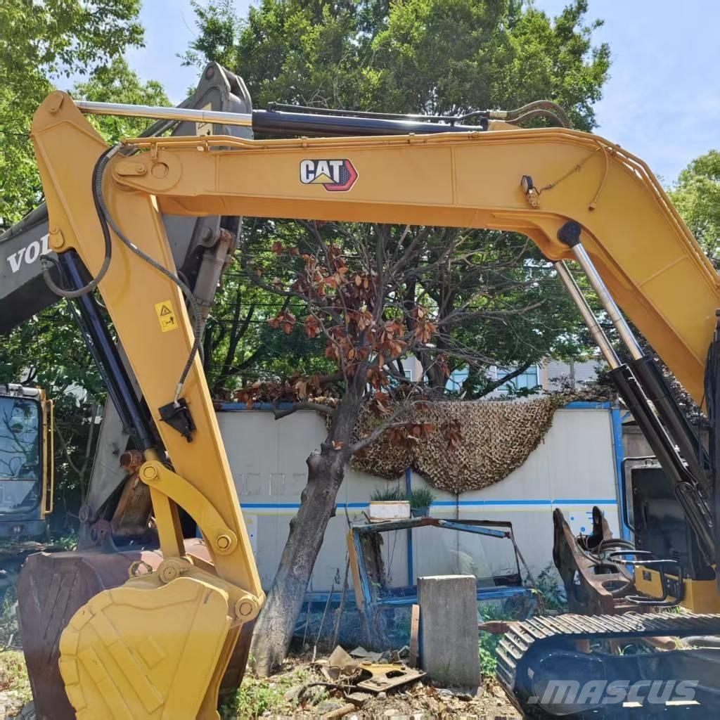 CAT 310 Гусеничні екскаватори