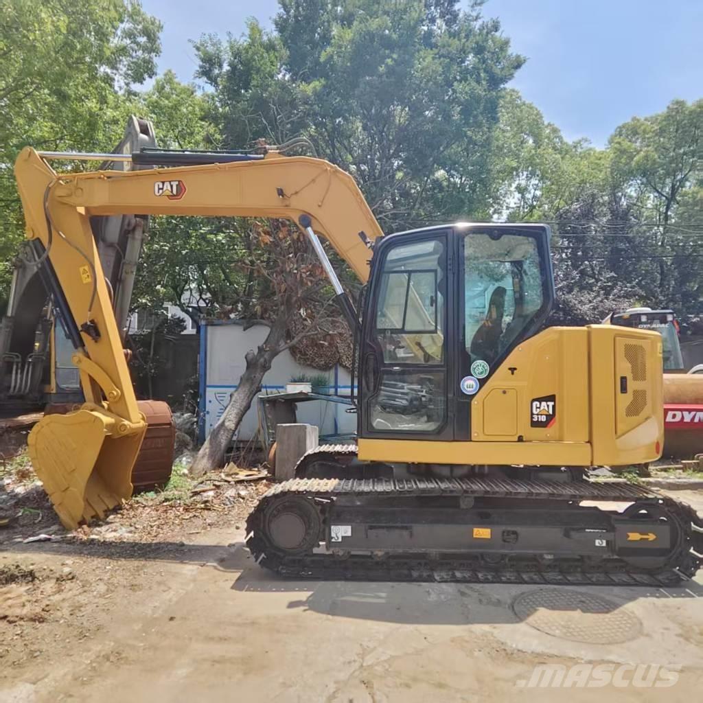 CAT 310 Гусеничні екскаватори