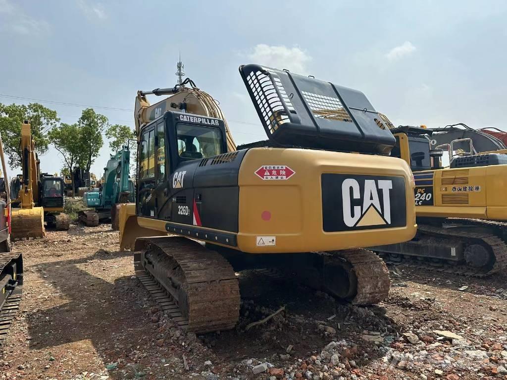 CAT 326 Гусеничні екскаватори