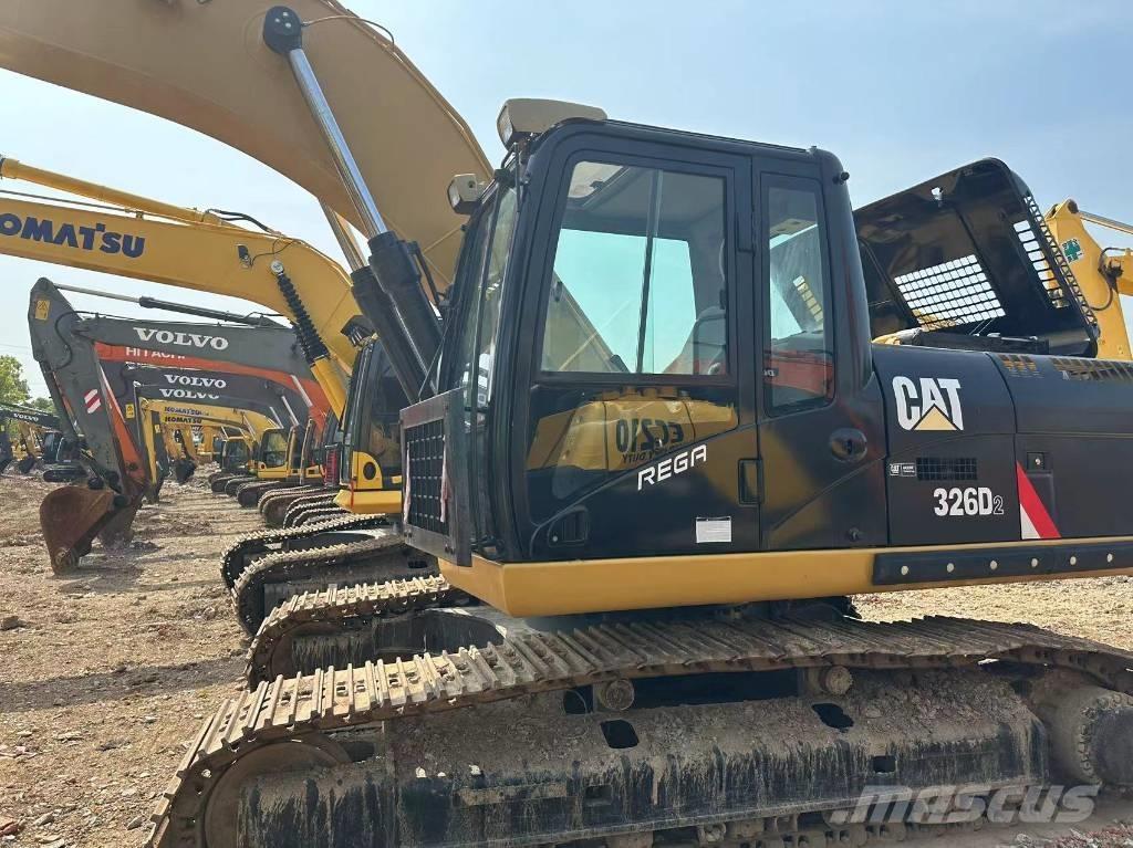 CAT 326 Гусеничні екскаватори