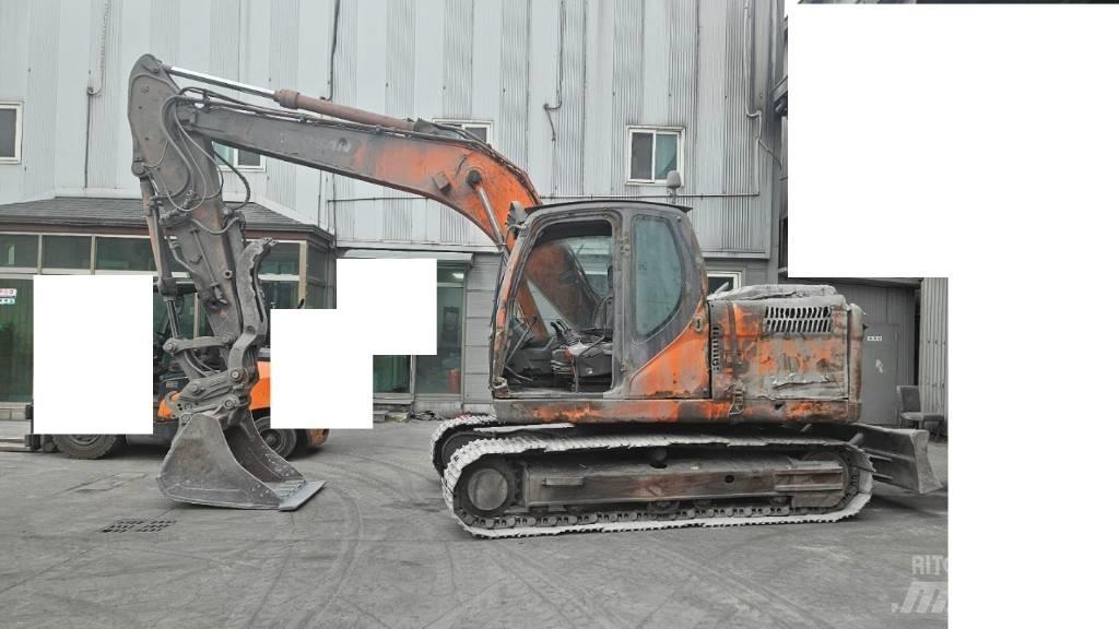 Doosan DX 140 LC Гусеничні екскаватори