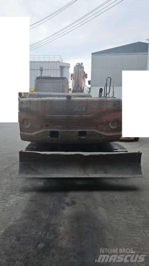 Doosan DX 140 LC Гусеничні екскаватори