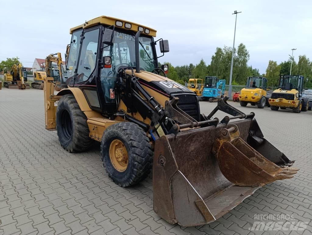 CAT 428 D Екскаватори-навантажувачі