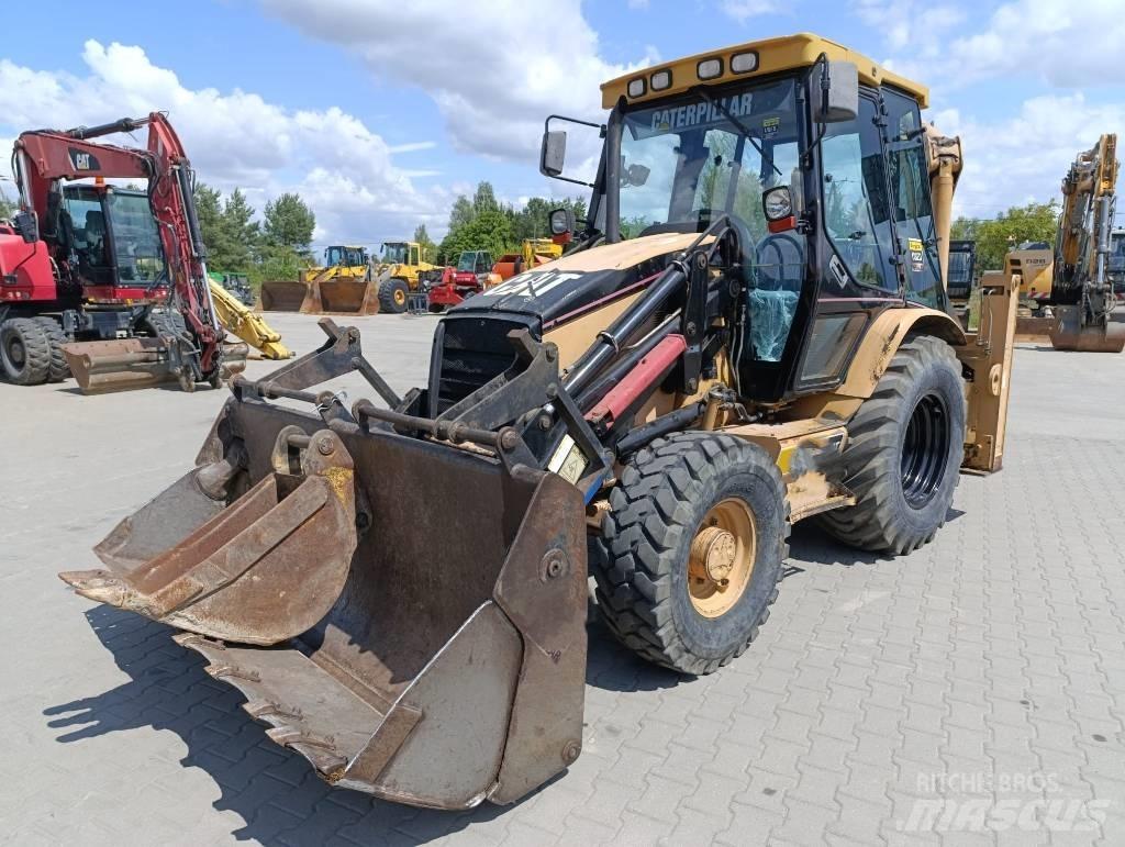 CAT 428 D Екскаватори-навантажувачі