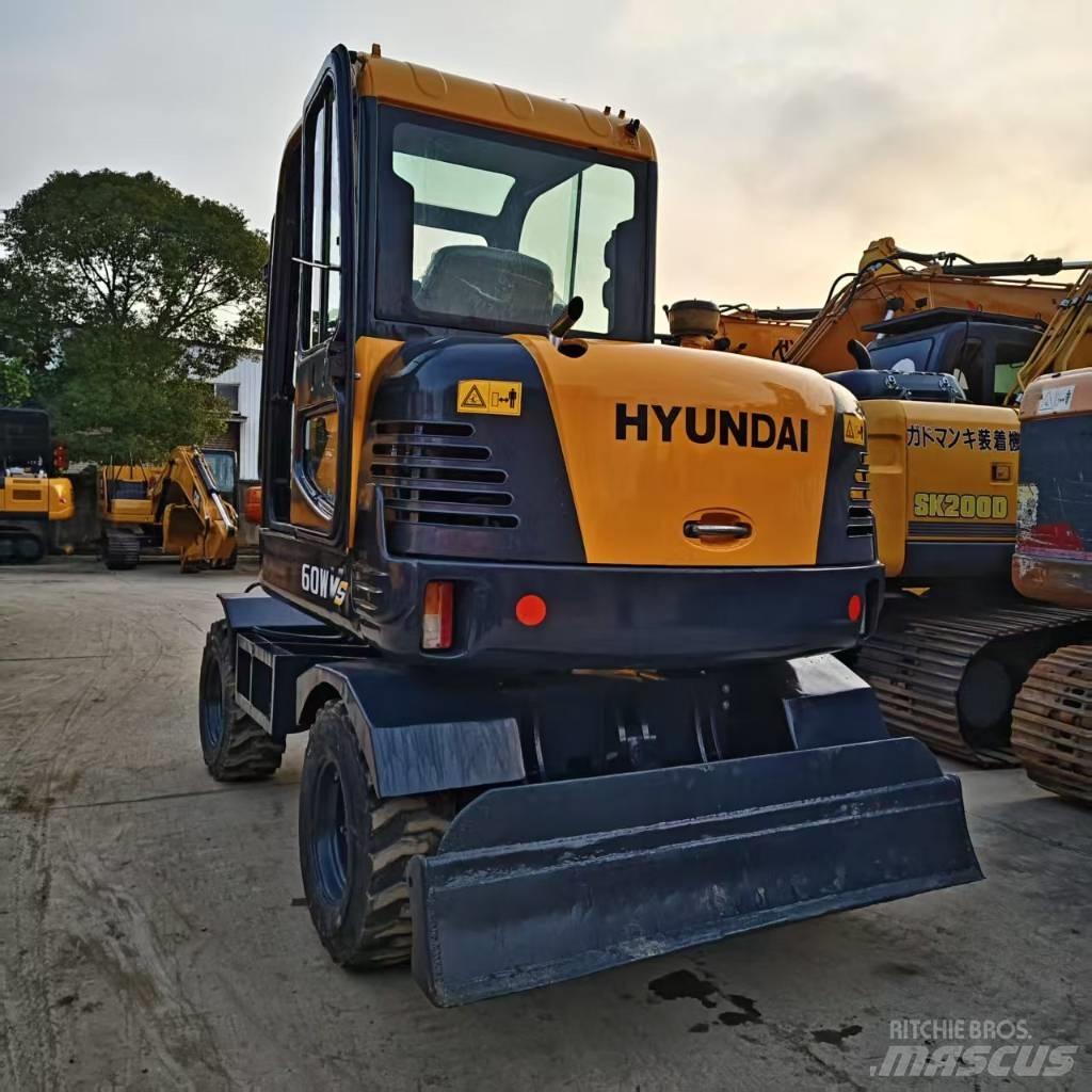 Hyundai 60W-9 Колісні екскаватори