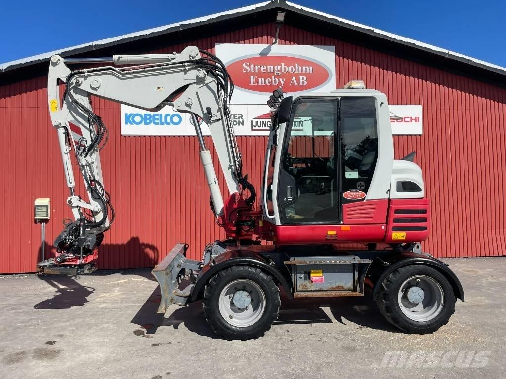 Takeuchi TB 295 W Колісні екскаватори