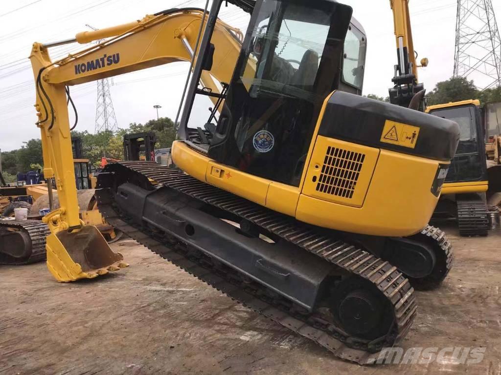 Komatsu PC 128 US Середні екскаватори 7т. - 12т.
