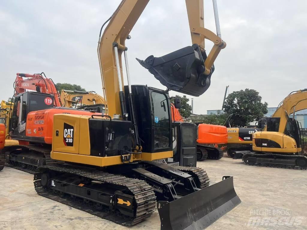 CAT 310 Гусеничні екскаватори