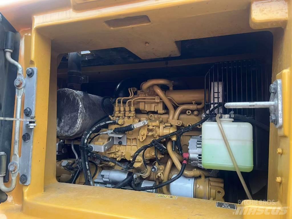CAT 310 Гусеничні екскаватори