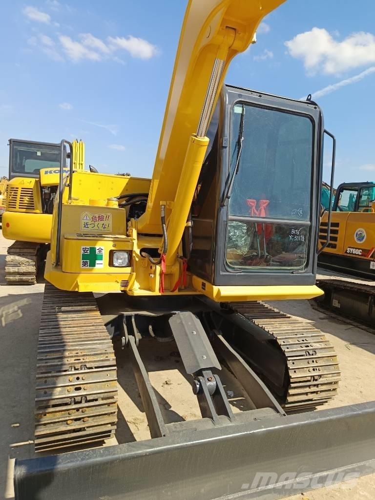 Komatsu PC 70 Гусеничні екскаватори