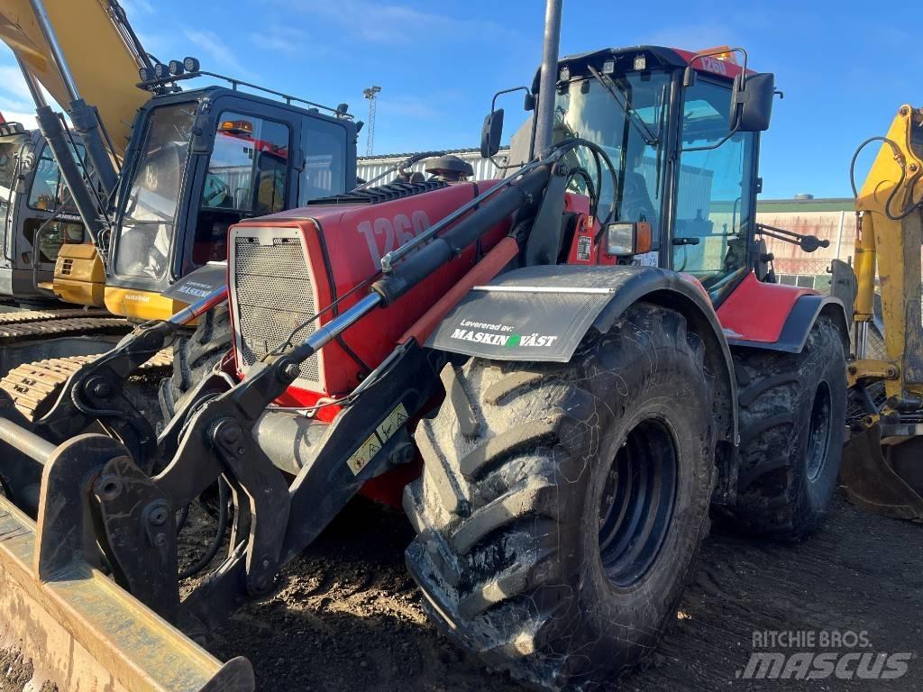 Huddig 1260 Екскаватори-навантажувачі
