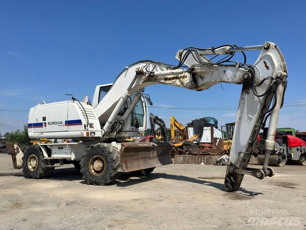 New Holland MH Plus Колісні екскаватори