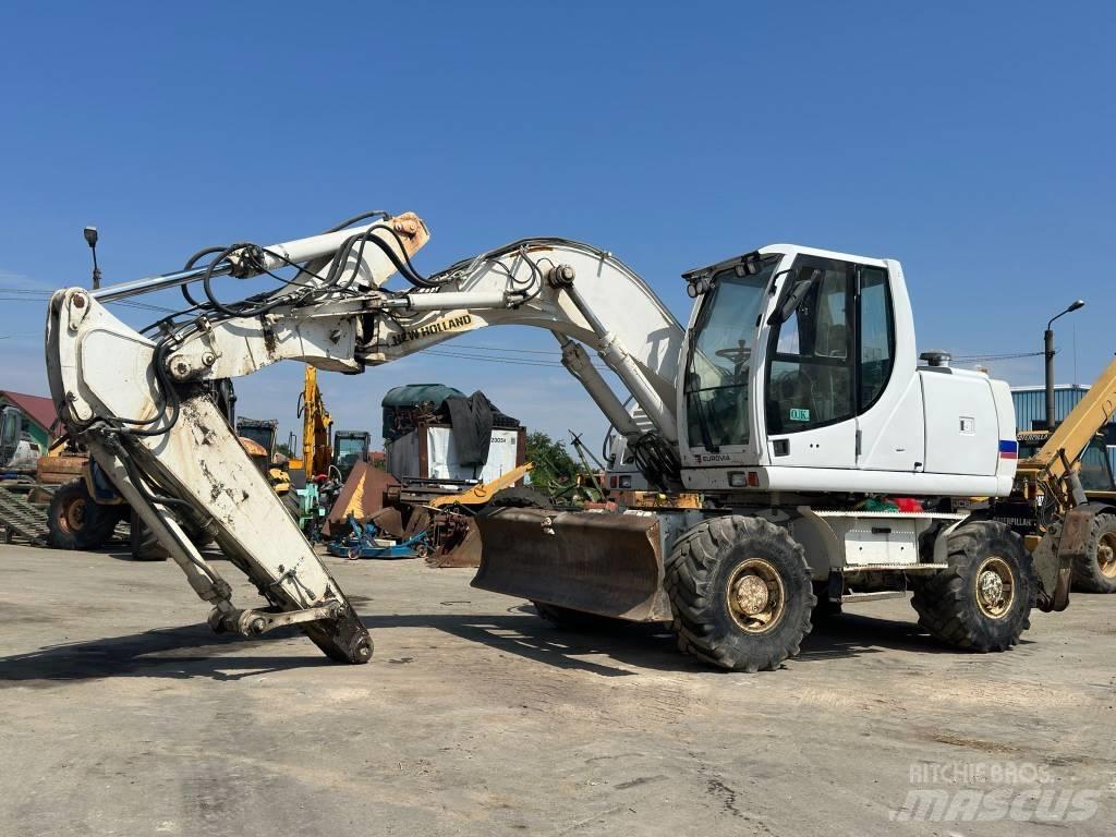New Holland MH Plus Колісні екскаватори
