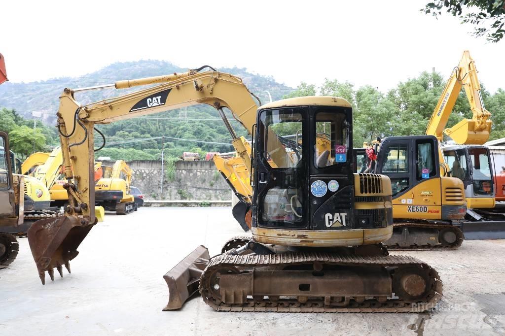 CAT 308 C Середні екскаватори 7т. - 12т.