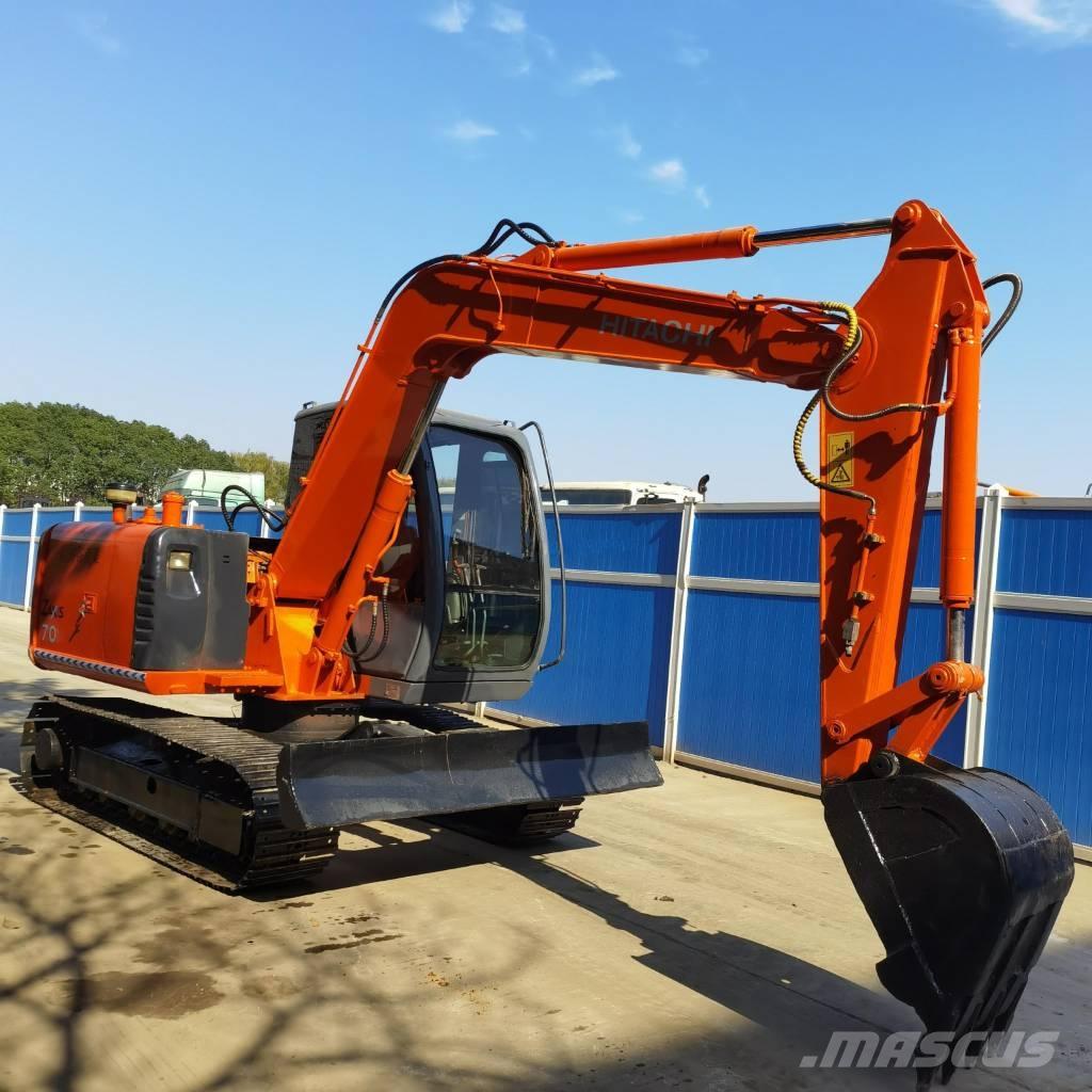 Hitachi ZX70 Середні екскаватори 7т. - 12т.