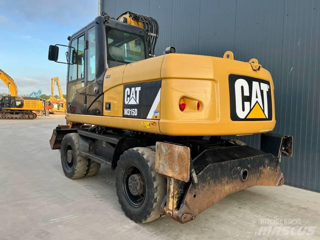 CAT M315D Колісні екскаватори