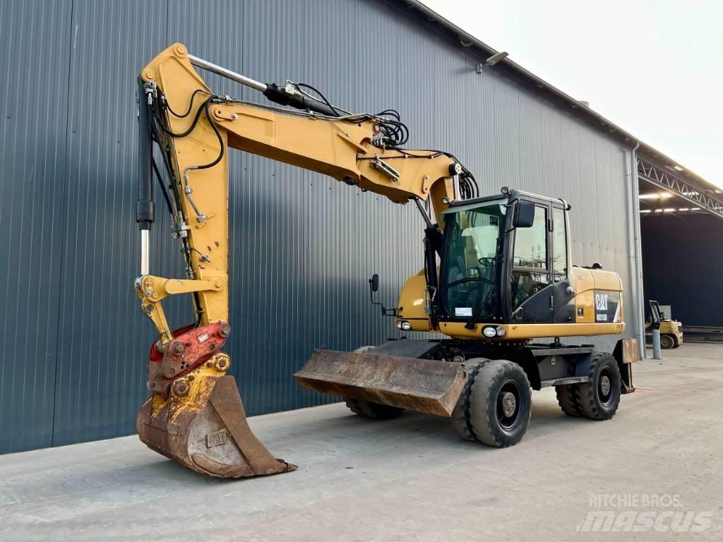 CAT M315D Колісні екскаватори