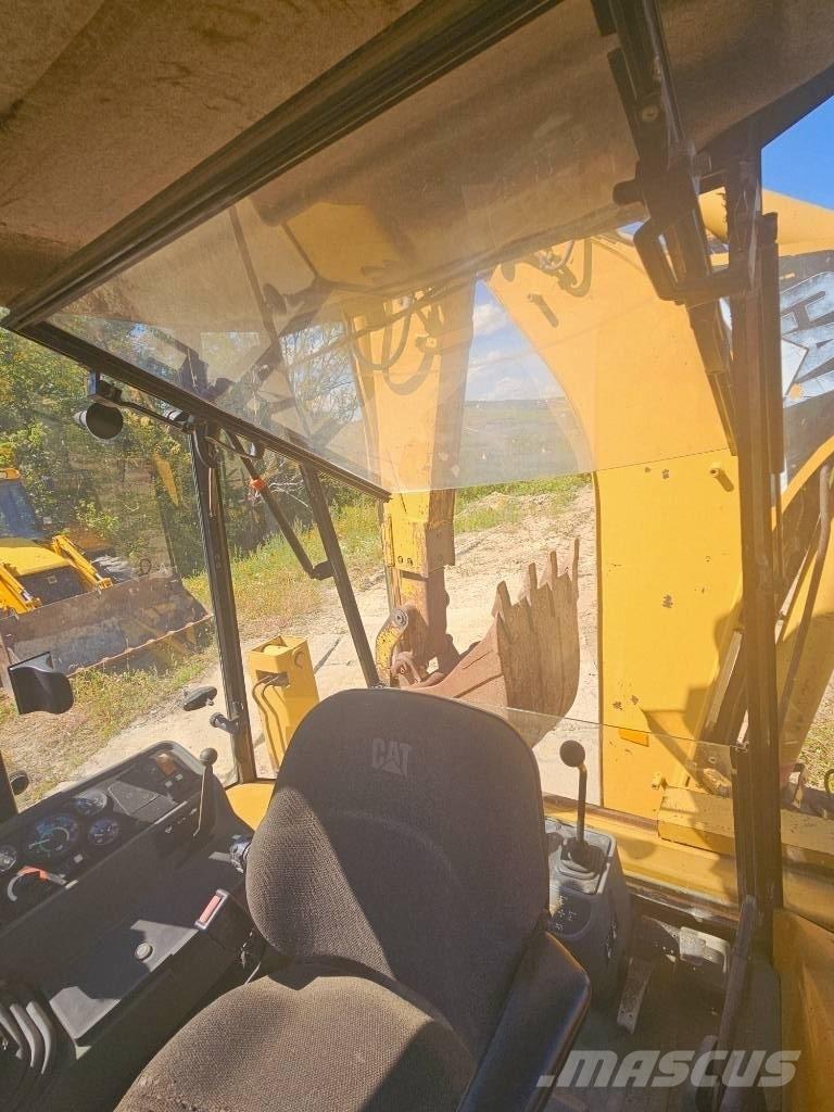 CAT 428 C Екскаватори-навантажувачі