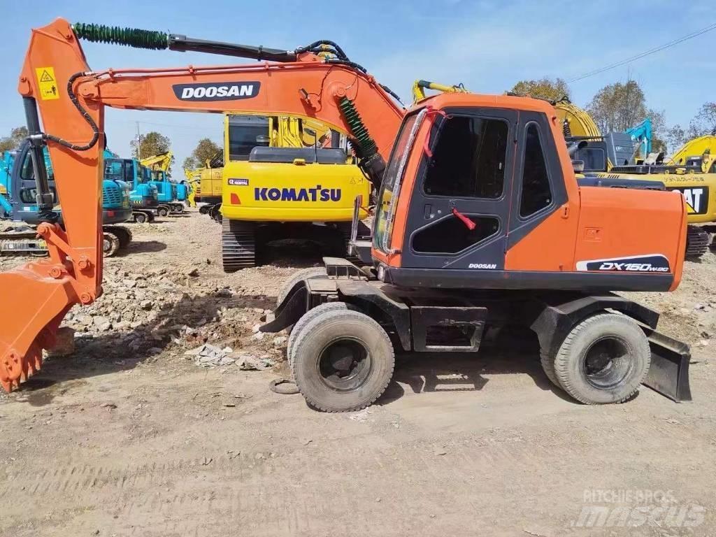 Doosan DX150W-9 Колісні екскаватори