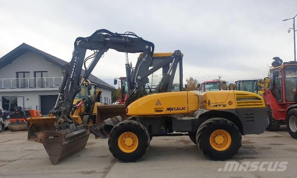 Mecalac 12 M TX Колісні екскаватори