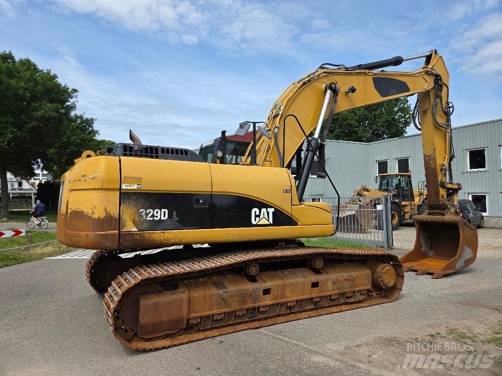 CAT 329DL Гусеничні екскаватори
