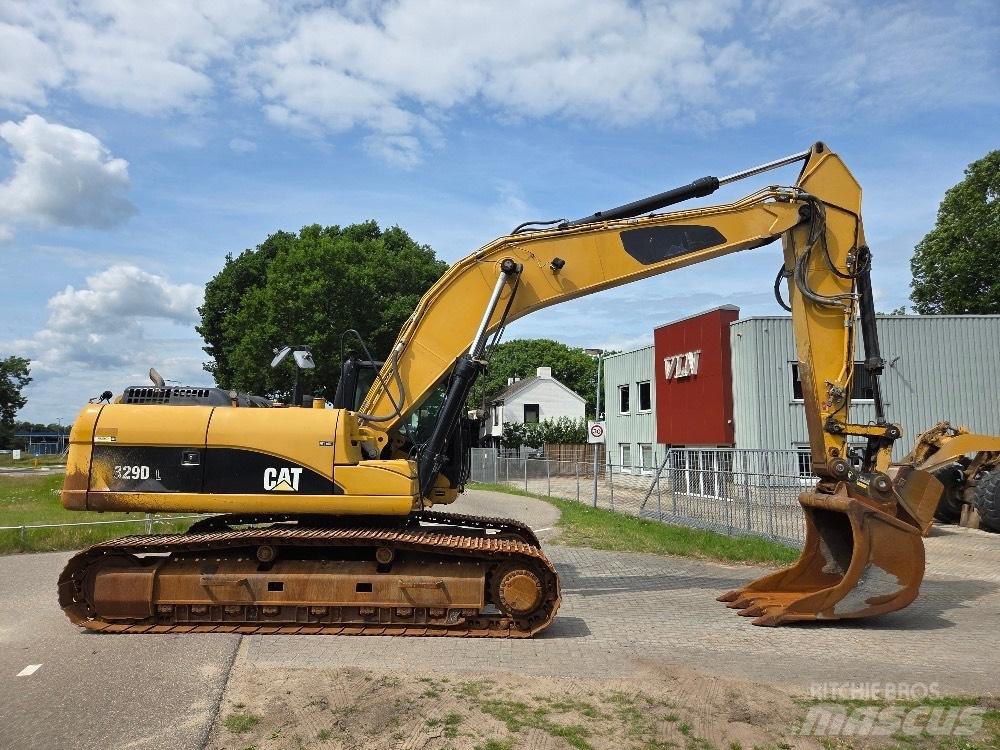 CAT 329DL Гусеничні екскаватори