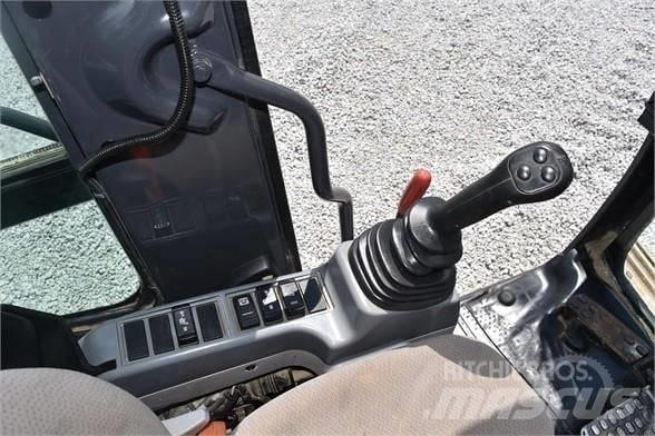 Hitachi ZX 135 Гусеничні екскаватори