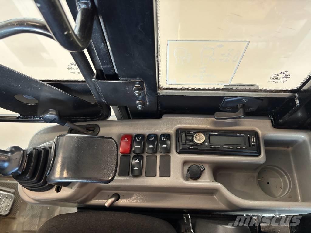 JCB 403 Багатофункціональне обладнання для вантажних і землекопальних робіт