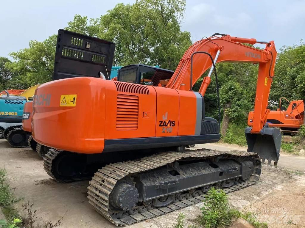 Hitachi ZX 210 Гусеничні екскаватори