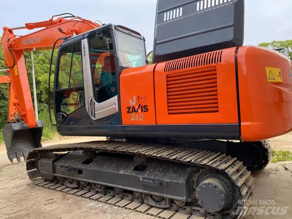 Hitachi ZX 210 Гусеничні екскаватори