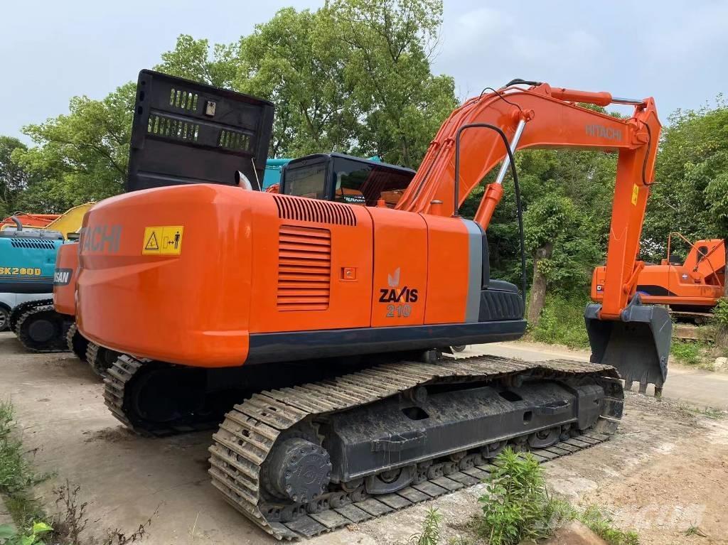 Hitachi ZX 210 Гусеничні екскаватори