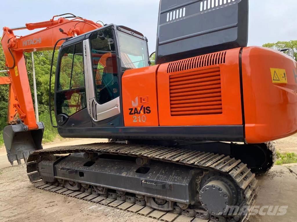 Hitachi ZX 210 Гусеничні екскаватори