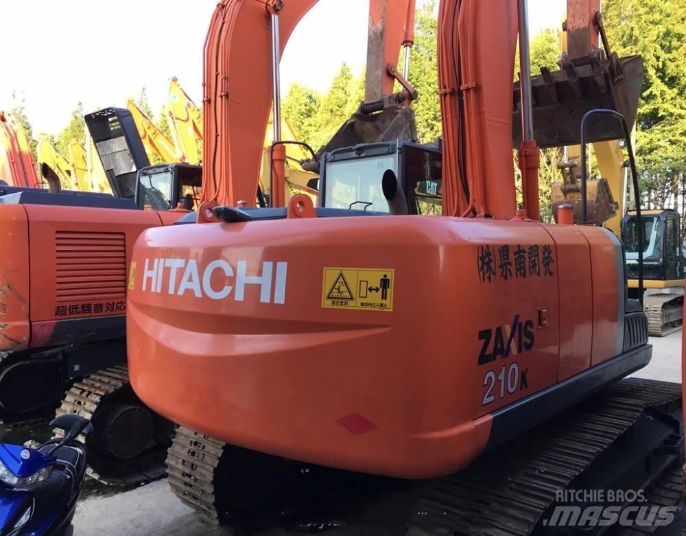 Hitachi zx210 Гусеничні екскаватори